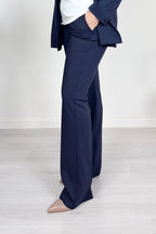 Pantalone fluido con lamé EMME