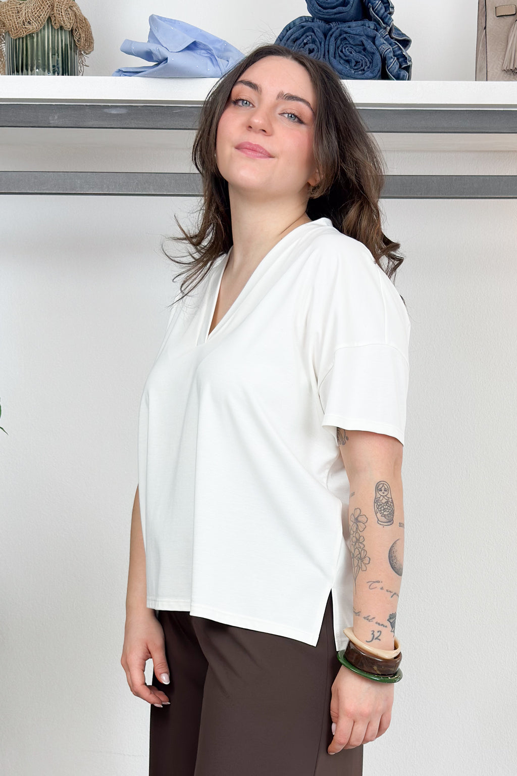 Blusa scollo a V in jersey KAOS