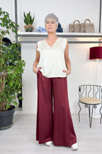 Top con scollo a V in raso KAOS