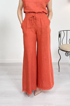 Pantalone palazzo in lino con fondo sfrangiato KAOS